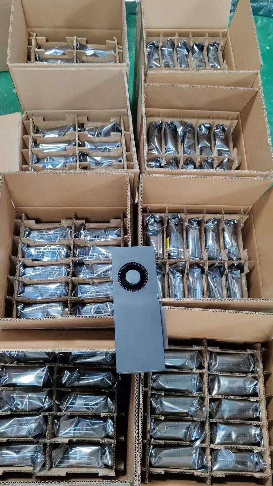 Bulk GPU inventory packed in shipping cartons